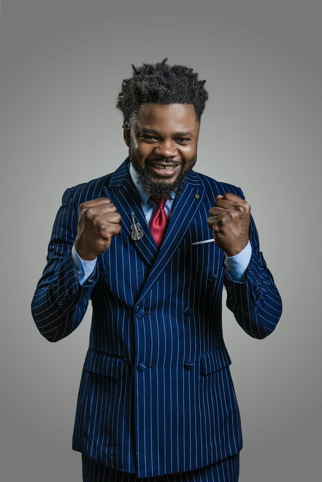 millionaire in suit smiling