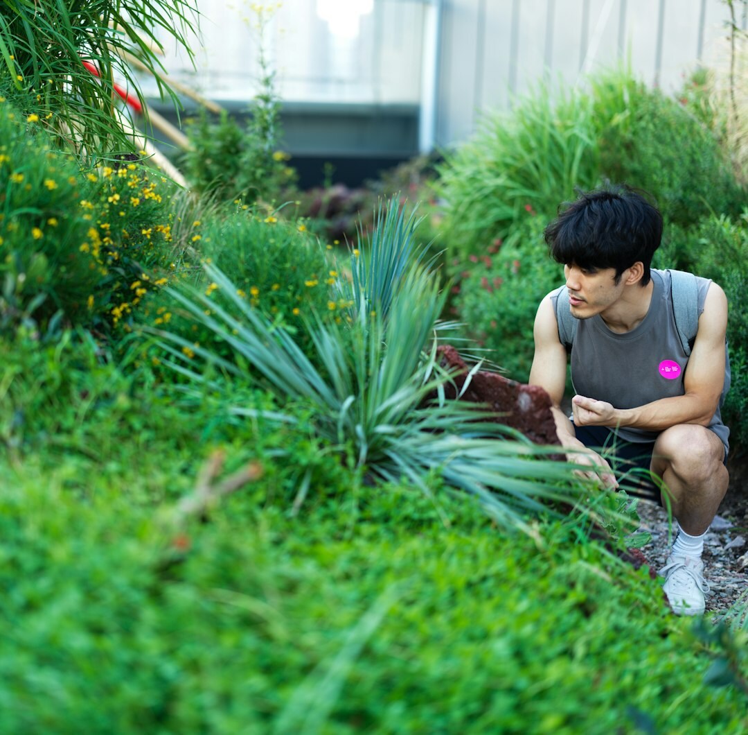 man relaxing in garden