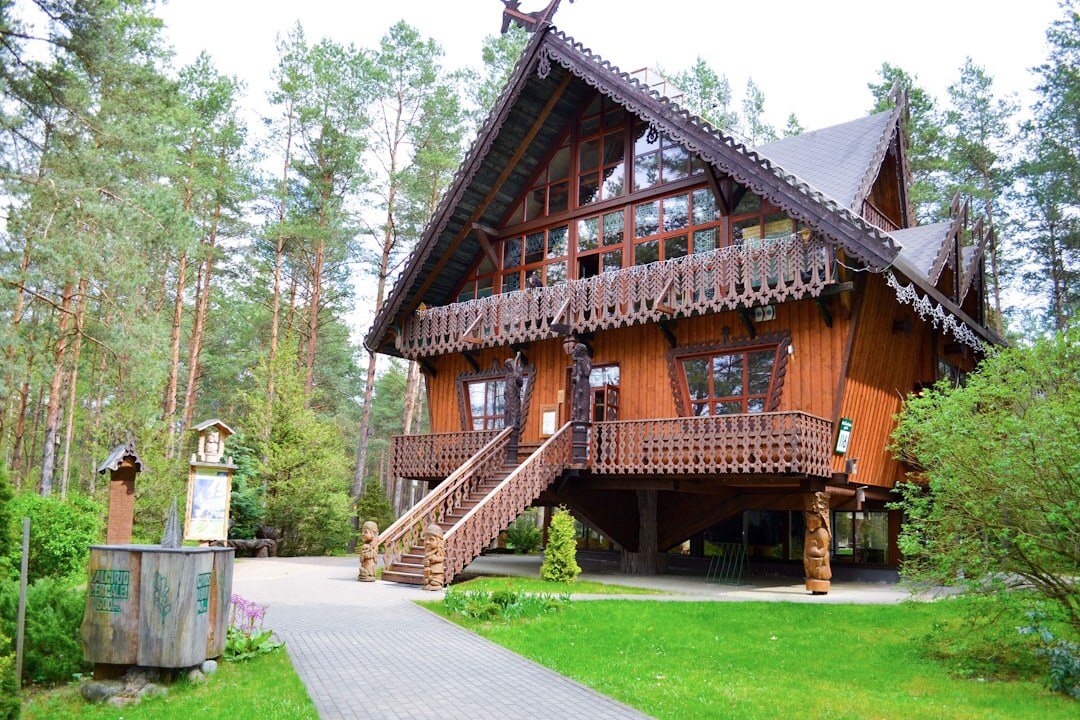 Wooden countryside house with a garden in Lithuania